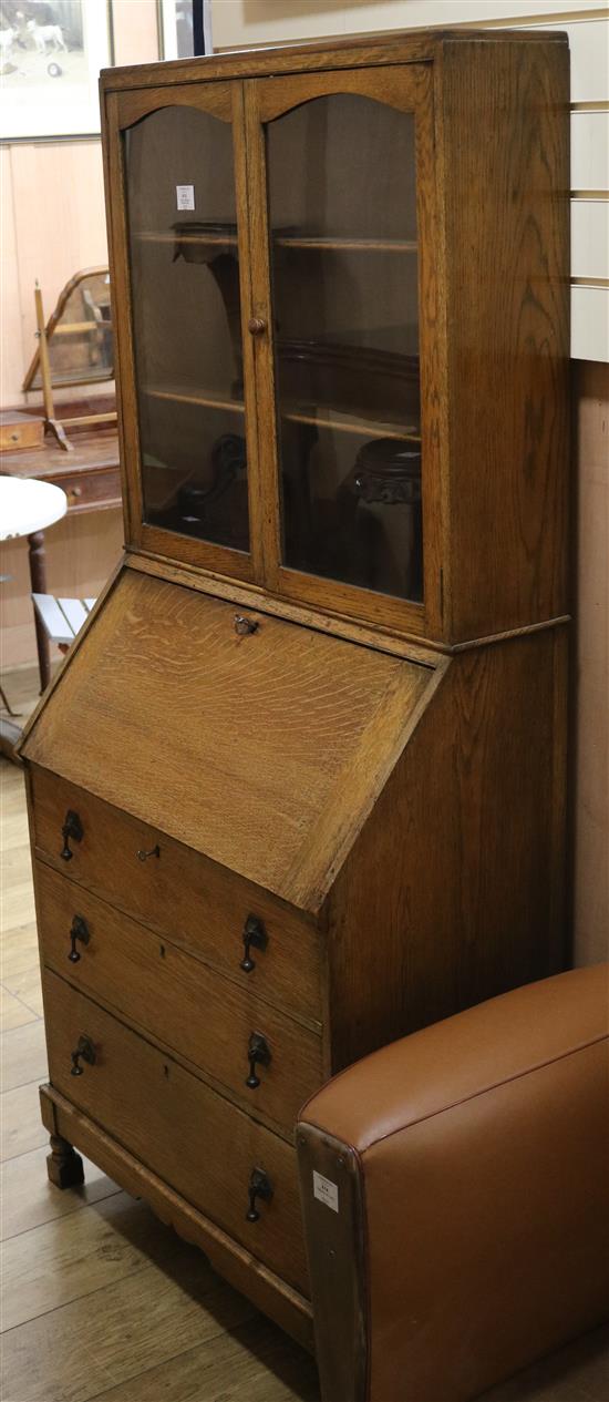 A 1920s oak bureau bookcase W.74cm